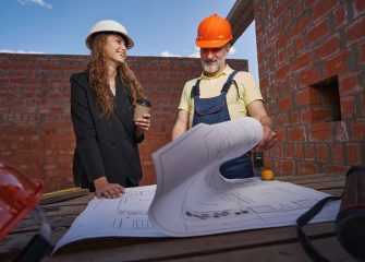 joyful-woman-smiling-at-worker-during-bluepring-ex-2023-11-27-05-10-52-utc.jpg